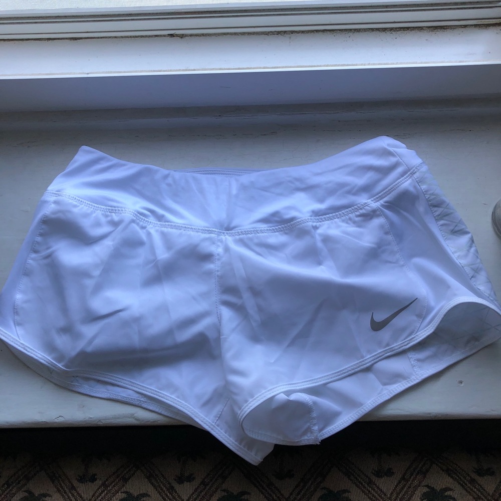 White Nike women’s running shorts